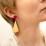 dangle earrings in gold and red wood