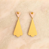 dangle earrings in gold and nude back