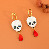 Hoops with skull charms